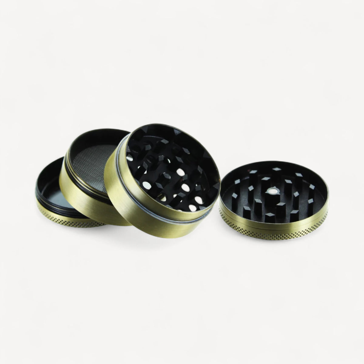4-delt grinder - guld